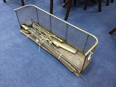 Lot 437 - A VICTORIAN BRASS FIRE FENDER AND FIRE TOOLS