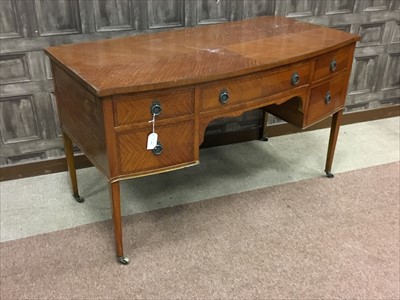 Lot 1360 - A LATE 19TH CENTURY SATINWOOD BOWFRONTED DESK