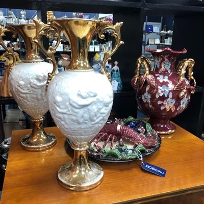 Lot 510 - A MAJOLICA PLAQUE AND THREE VASES