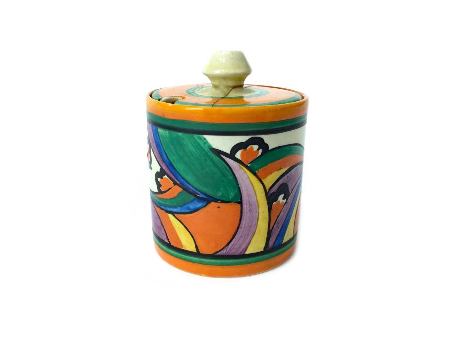 Lot 1014 - A CLARICE CLIFF 'COMETS' PATTERN PRESERVE POT AND COVER