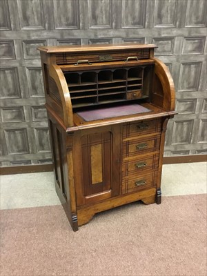 Lot 1364 - A WALNUT CYLINDER TOP BUREAU BY TEES & CO OF MONTREAL