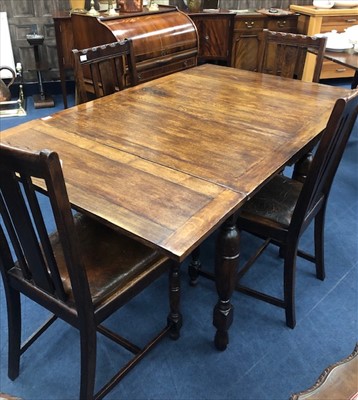 Lot 201 - AN OAK DRAW LEAF TABLE AND FOUR CHAIRS