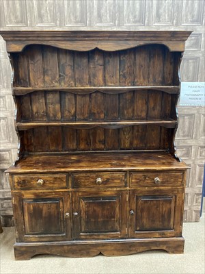 Lot 205 - A STAINED PINE DRESSER