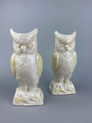 Lot 216 - A PAIR OF BELLEEK VASES MODELLED AS OWLS, A TWIN HANDLED VASE AND OTHER ITEMS