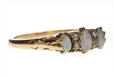 Lot 819 - AN OPAL AND DIAMOND RING