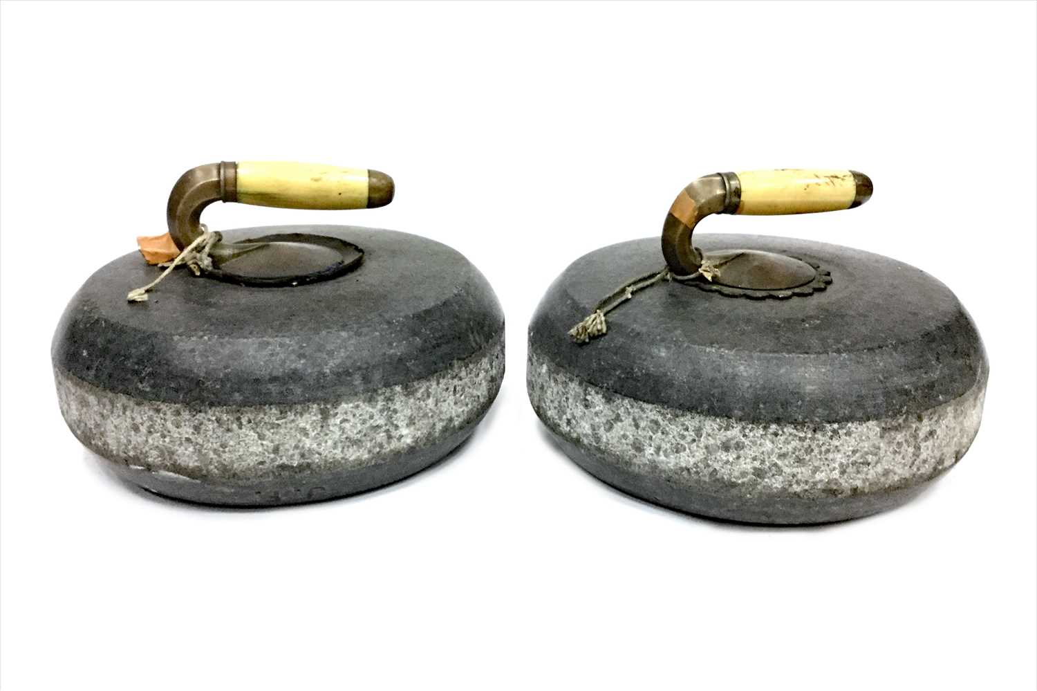 Lot 1817 - A PAIR OF EARLY 20TH CENTURY CURLING STONES