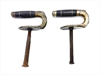 Lot 1863 - A PAIR OF EARLY 20TH CENTURY CURLING STONE HANDLES