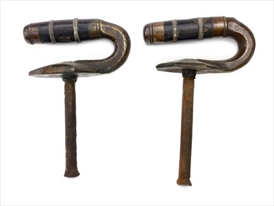 Lot 1866 - A PAIR OF EARLY 20TH CENTURY CURLING STONE HANDLES