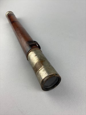 Lot 20 - A TELESCOPE WITH LEATHER COVER