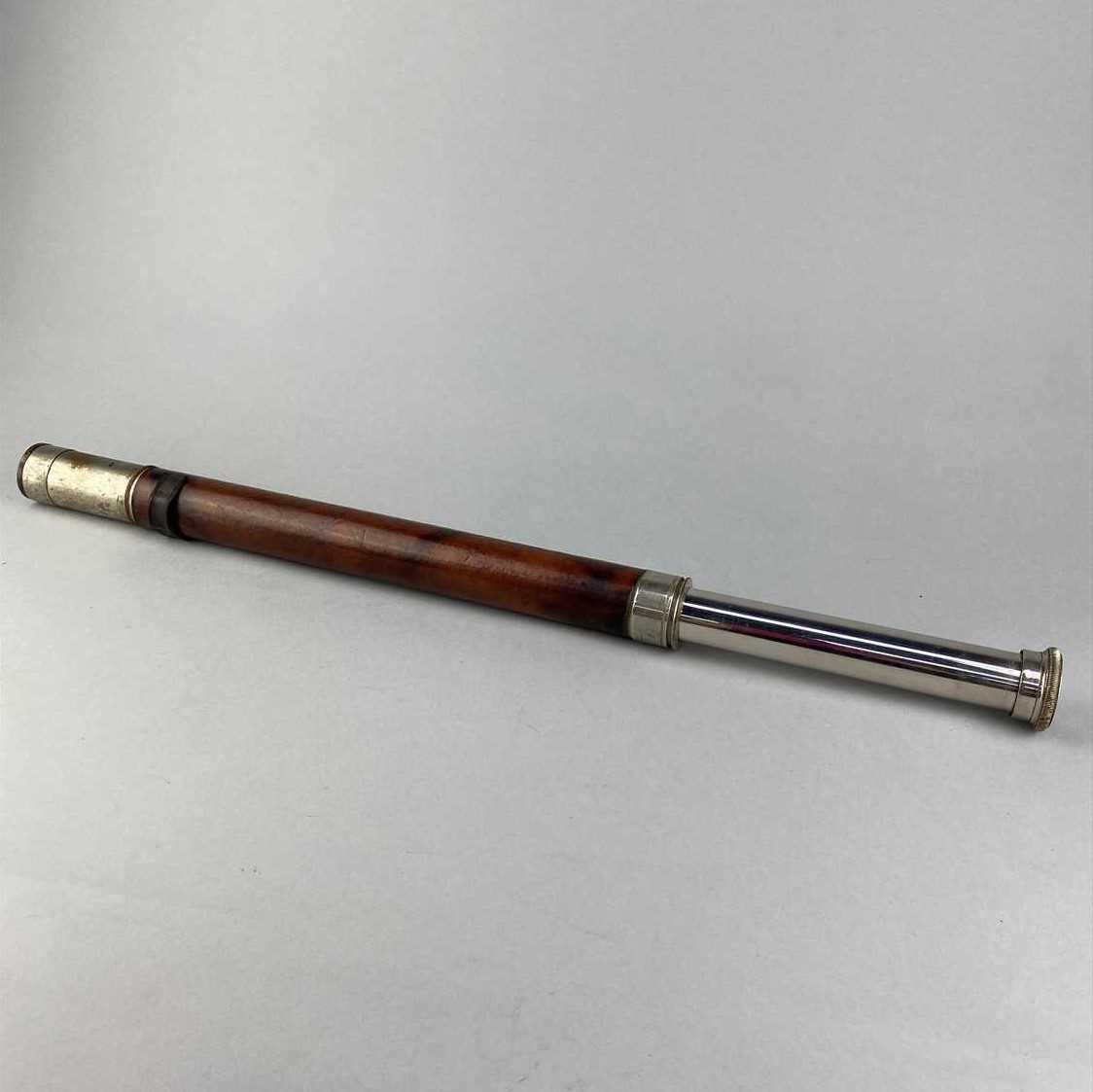 Lot 20 - A TELESCOPE WITH LEATHER COVER