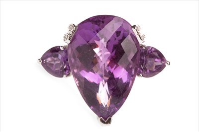 Lot 855 - A PURPLE GEM AND DIAMOND COCKTAIL RING