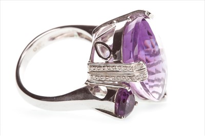 Lot 855 - A PURPLE GEM AND DIAMOND COCKTAIL RING
