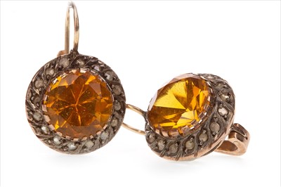 Lot 860 - A PAIR OF YELLOW GEM SET AND DIAMOND EARRINGS
