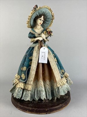 Lot 72 - A RESIN FIGURE OF A FEMALE AND FOUR OTHER FIGURES