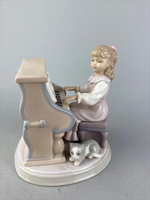 Lot 184 - A LEONARDO COLLECTION OF A GIRL PLAYING PIANO AND OTHER FIGURES