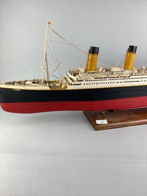 Lot 185 - A MODEL OF THE TITANIC ON A WOOD STAND