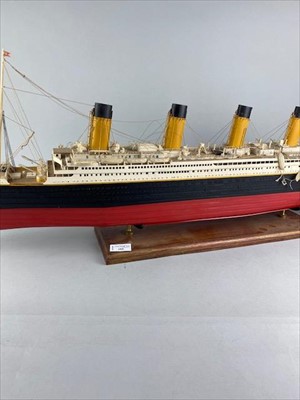 Lot 185 - A MODEL OF THE TITANIC ON A WOOD STAND