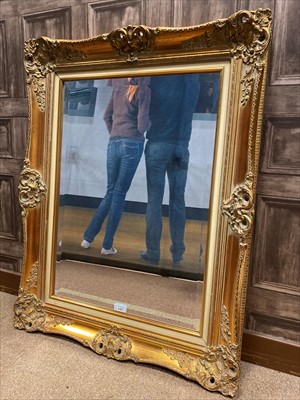 Lot 1383 - A REPRODUCTION VICTORIAN STYLE GILT FRAMED WALL MIRROR