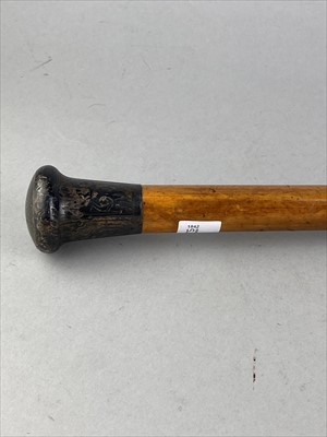 Lot 327 - A MALACCA CANE WITH SILVER TOP