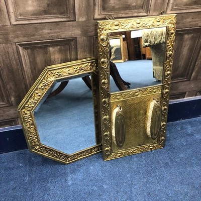 Lot 336 - A BRASS OCTAGONAL WALL MIRROR AND A MIRRORED BRUSH RACK