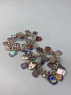 Lot 355 - A LOT OF TWO SILVER CHARM BRACELETS