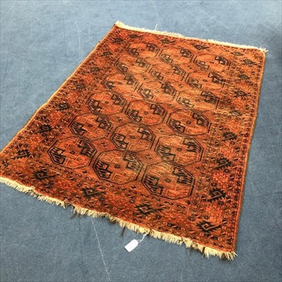 Lot 383 - A PERSIAN FRINGED AND BORDERED RUG