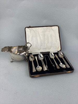 Lot 413 - A SET OF TWELVE SILVER SPOONS AND SUGAR TONGS
