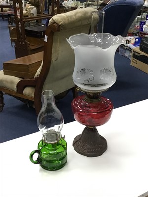 Lot 478 - A VICTORIAN CAST METAL OIL LAMP AND ANOTHER LAMP