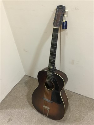 Lot 496 - A MICHIGAN ACOUSTIC GUITAR AND SHEET MUSIC