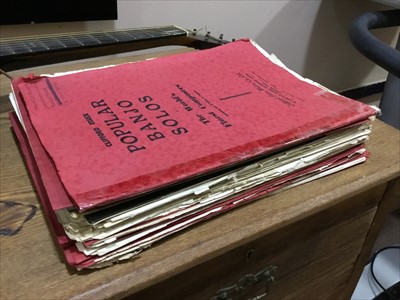 Lot 496 - A MICHIGAN ACOUSTIC GUITAR AND SHEET MUSIC