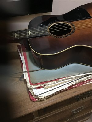 Lot 496 - A MICHIGAN ACOUSTIC GUITAR AND SHEET MUSIC
