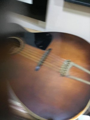 Lot 496 - A MICHIGAN ACOUSTIC GUITAR AND SHEET MUSIC