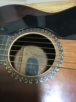Lot 496 - A MICHIGAN ACOUSTIC GUITAR AND SHEET MUSIC