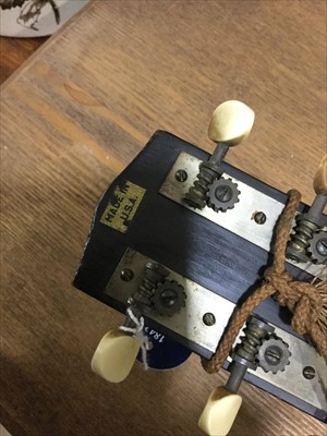 Lot 496 - A MICHIGAN ACOUSTIC GUITAR AND SHEET MUSIC