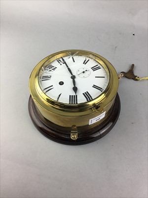 Lot 498 - A BRASS CASED SHIP'S CLOCK