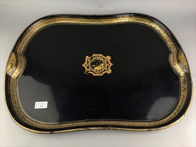 Lot 470 - A 19TH CENTURY GILT AND BLACK LACQUERED METAL TRAY