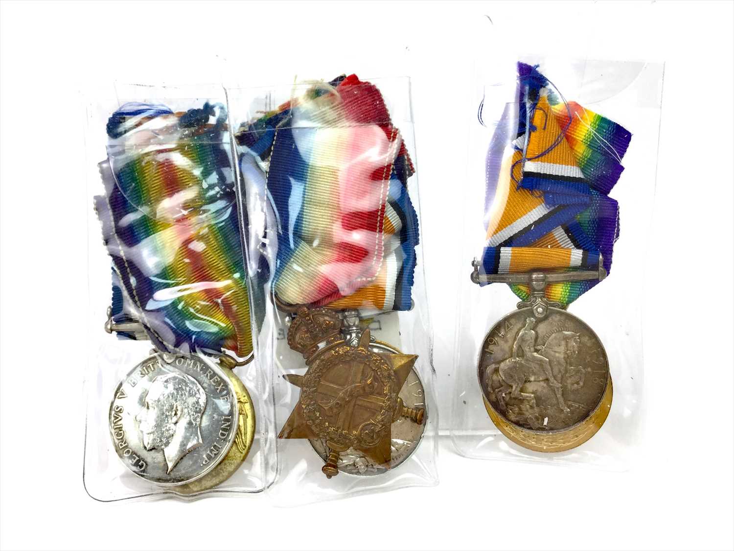 Lot 1423 - A WWII TRIO OF MEDALS AND TWO PAIRS