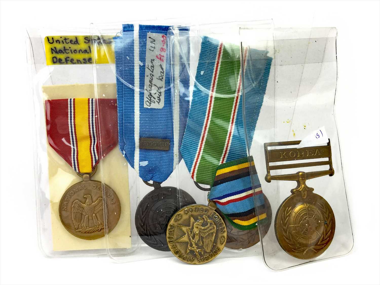 Lot 1425 - A LOT OF THREE UNITED NATIONS MEDALS AND TWO U. S. MEDALS