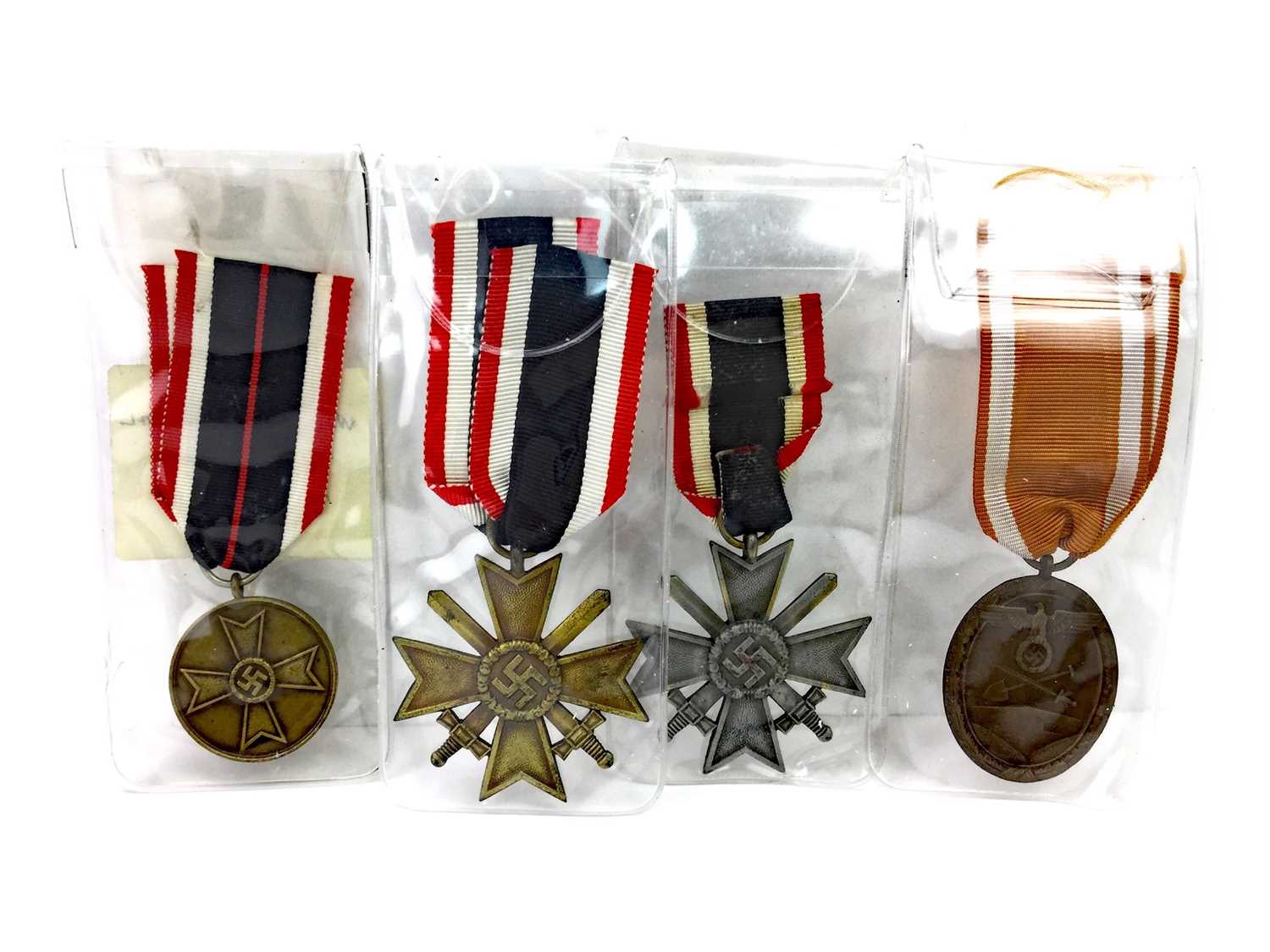 Lot 1313 - A LOT OF TWO GERMAN WWII WAR MERIT CROSSES AND TWO OTHERS