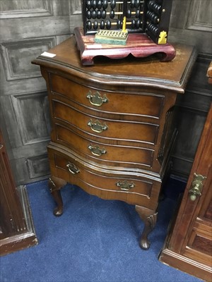 Lot 556 - A PAIR OF MAHOGANY BOWFRONTED BEDSIDE CABINETS