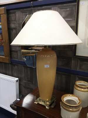 Lot 560 - A LARGE CERAMIC AND BRASS TABLE LAMP