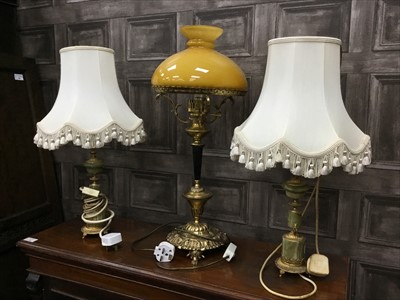 Lot 561 - A PAIR OF ONYX AND BRASS TABLE LAMPS AND ANOTHER TABLE LAMP