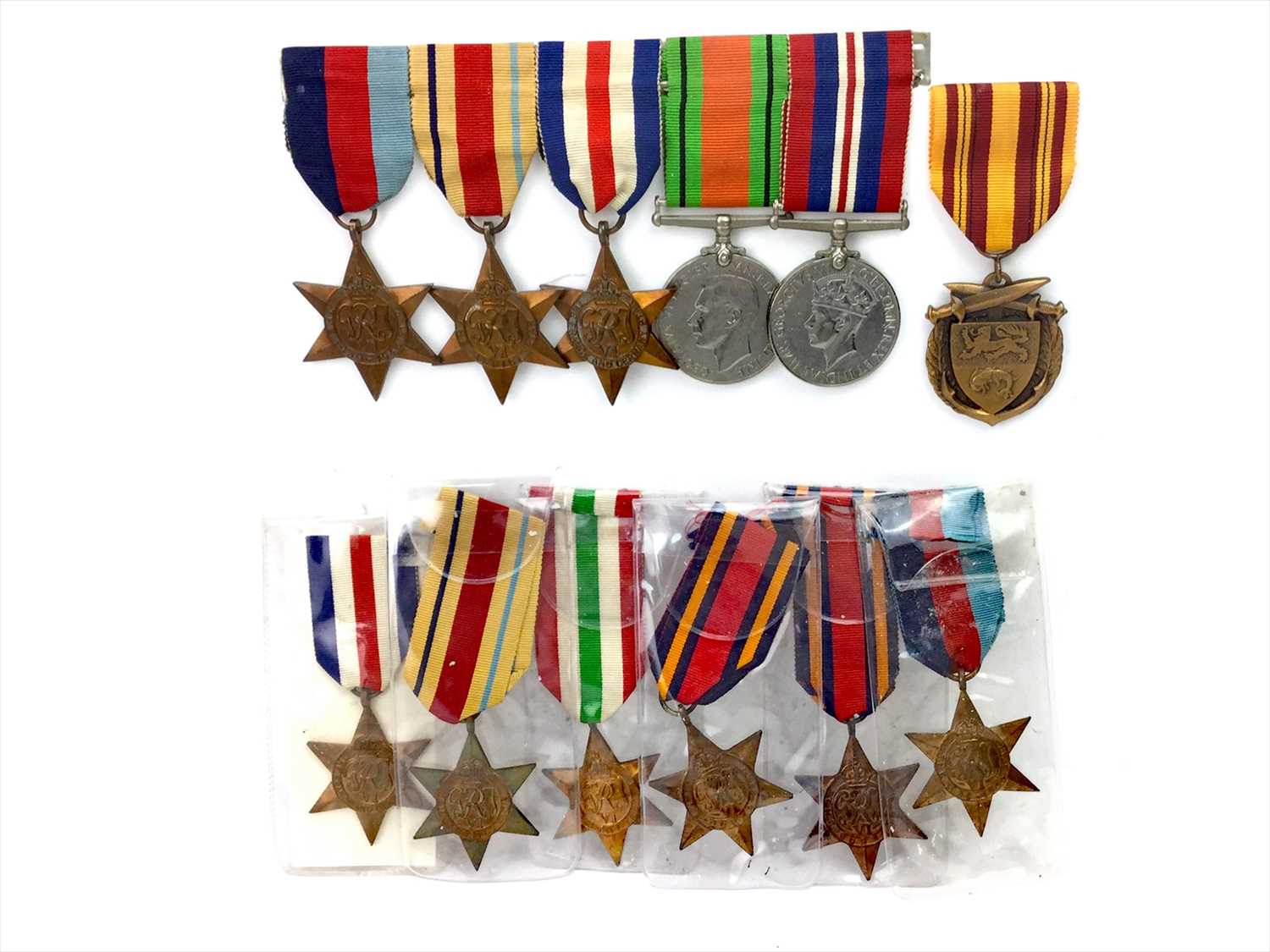 Lot 1437 - A DUNKIRK MEDAL, A GROUP OF WWII MEDALS AND SIX STARS