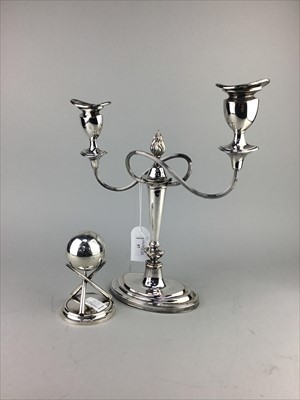 Lot 57 - A PLATED CANDELABRUM AND A BOWLING JACK