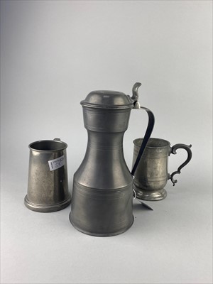 Lot 58 - A PEWTER TAPPIT HEN, MUGS AND MEASURES
