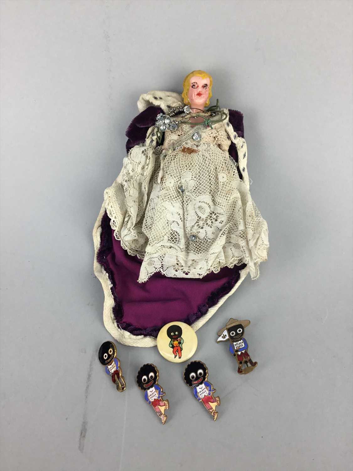 Lot 14 - A SMALL CELLULOID REGAL DOLL AND A GROUP OF ROBERTSONS BADGES