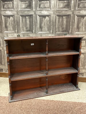 Lot 1449 - A 19TH CENTURY MAHOGANY OPEN WALL MOUNTING BOOK RACK