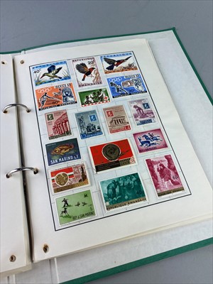 Lot 128 - A LOT OF THREE ALBUMS OF WORLD STAMPS