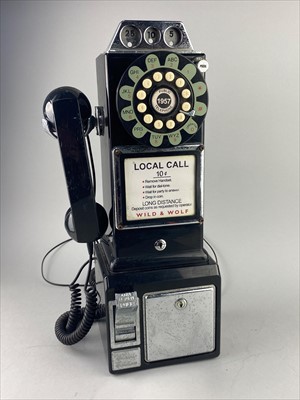 Lot 51 - A REPRODUCTION WALL MOUNTED PHONE AND A TABLE GLOBE MOUNTED IN A METAL STAND