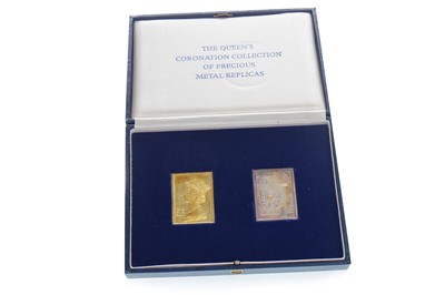 Lot 9 - A GOLD AND SILVER STAMP SET